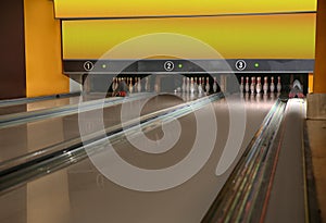 Bowling alley lanes with pins