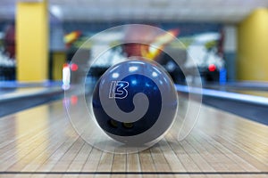 Bowling ball closeup on lane background