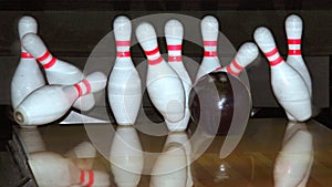 Bowling ball and falling pins