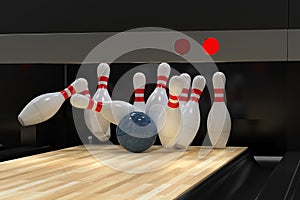 Bowling ball hitting all 10 pins, in a Strike