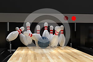 Bowling ball hitting all 10 pins, in a Strike