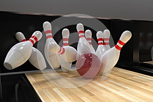 Bowling ball hitting all 10 pins, in a Strike