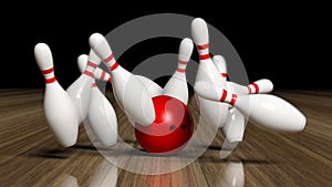 Bowling ball and pins in motion photo
