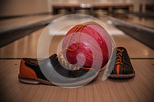 The bowling ball is ready to strike