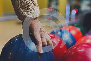 Bowling ball and shoes on lane background