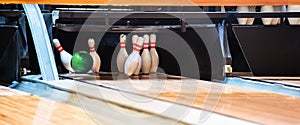 Bowling Ball Striking Pins on Alley