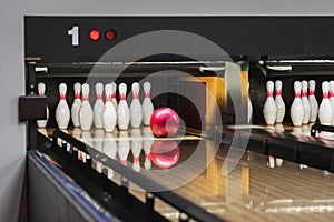 Bowling game, the ball rolls into the pins