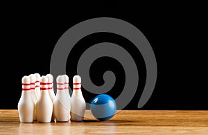 Bowling pins and bowling ball in miniature