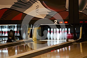 Bowling pins falling from ball