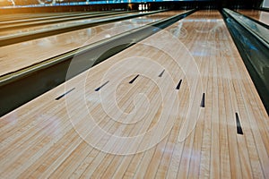 Bowling wooden floor with lane.