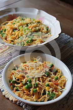 Bowls of Asian noodles - selective focus  - vertical