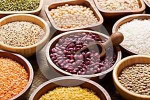 Bowls of legumes, lentils, chickpeas, beans, rice and cereals