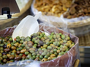 Bowls of olives for sale at a market