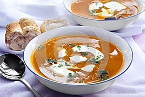 Bowls of Pumpkin Soup with Bread