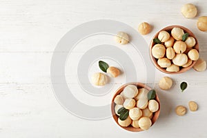 Bowls with shelled organic Macadamia nuts