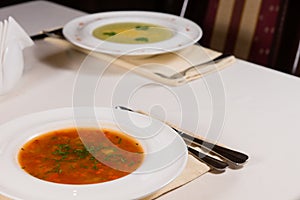 Bowls of Soup on Restaurant Table