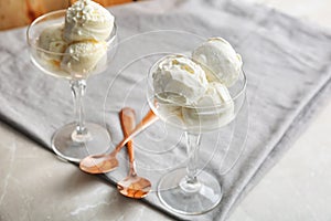 Bowls with tasty vanilla ice cream