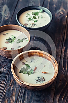 Bowls of thai tom kha soup