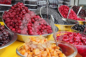 Bowls of Traditionally Dried and Processed Sour Plums Cherries and Forest Fruits