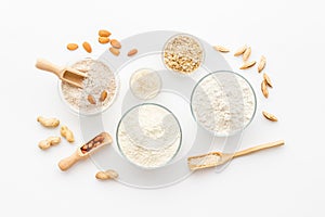 Bowls of various gluten free flour - almond peanut oat and rice buckwheat flour