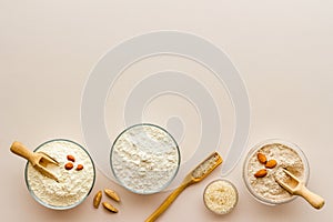 Bowls of various gluten free flour - almond peanut oat and rice buckwheat flour