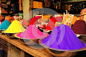 Bowls of vibrant colored dyes in India