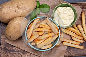 Bown with fresh cooked french fries potato chips with belgian mayonnaise sauce