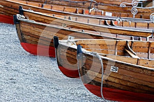 BOWNESS ON WINDERMERE, LAKE DISTRICT/ENGLAND - AUGUST 20 : Rowing Boats Beached at Bowness on Windermere in the Lake District Eng