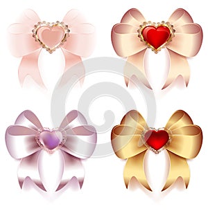 Bows of satin and silk ribbons with hearts and gold ornaments decoration