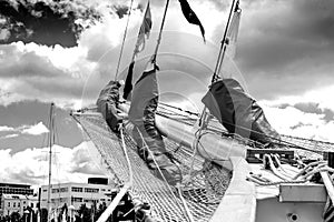 Bowsprit and gathered sail of the sailing ship.