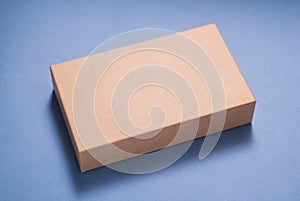 Box on blue background, close-up,