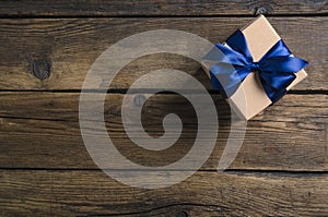Box with blue ribbon bow gift