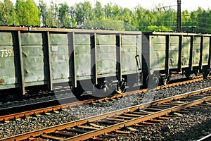 Box cars and tanker on tracks