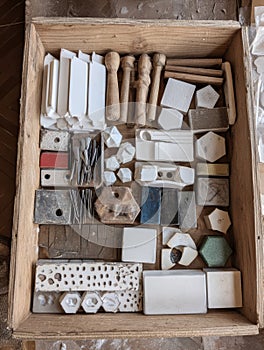 Box of Ceramic Tile Spacers and Tools Organized for Flooring and Wall Projects