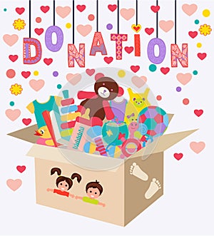 Box with child clothes and toys