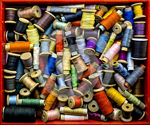 Box with colored threads for sewing
