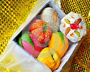 Box of Colorful homemade diwali sweets