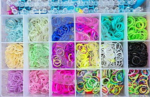 Box with colorful rubber bands for rainbow loom