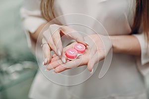 Box container for contact lenses woman hands holding case for lens