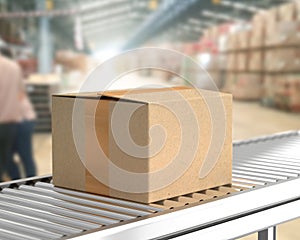 Box on conveyor roller in warehouse mock-up