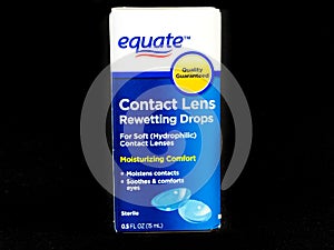 Box of Equate Contact Lens Rewetting Drops on a black backdrop