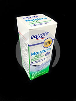 Box of Equate Contact Lens Solution on a black backdrop