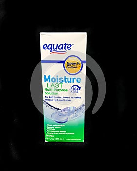 Box of Equate Contact Lens Solution on a black backdrop
