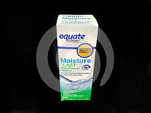 Box of Equate Contact Lens Solution on a black backdrop