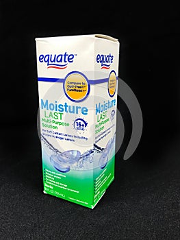 Box of Equate Contact Lens Solution on a black backdrop