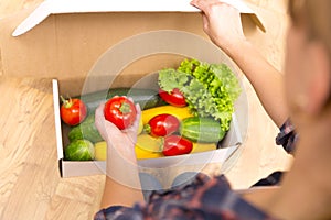 Box of fresh organic vegetables and fruits