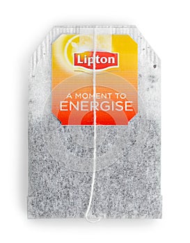 Box of Lipton Tea with teabags and cup on white
