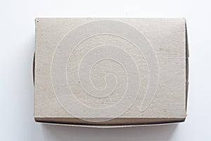 Box made of unpainted cardboard, isolated on a white background