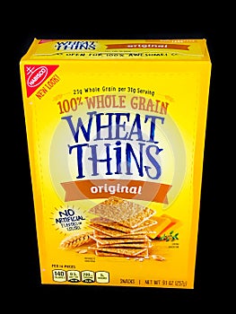 A Box of Nabisco Wheat Thins on a Black Backdrop