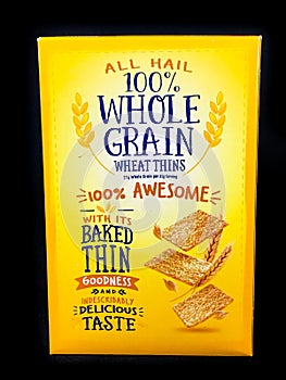 A Box of Nabisco Wheat Thins on a Black Backdrop
